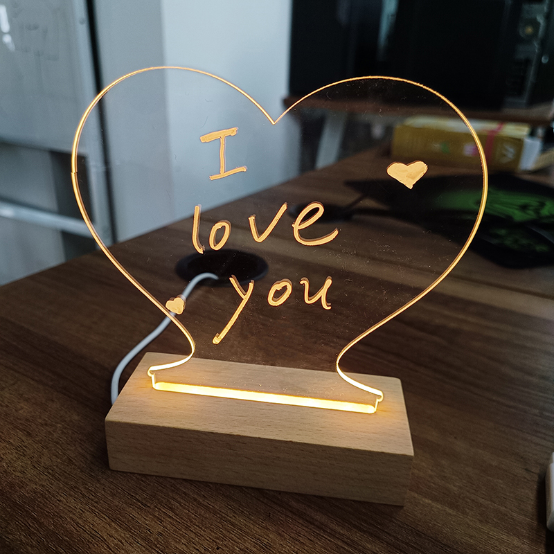 Turn on the lamp and enjoy the illuminated writing.